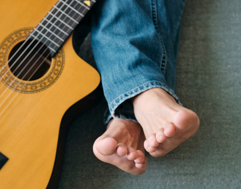 bare feet and guitar